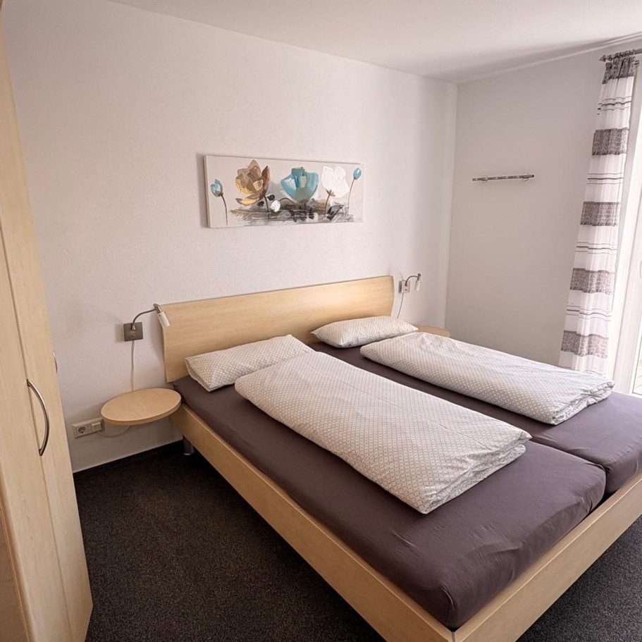 Unser Schlafzimmer lädt zum Träumen ein. Schlafzimmer mit Bett